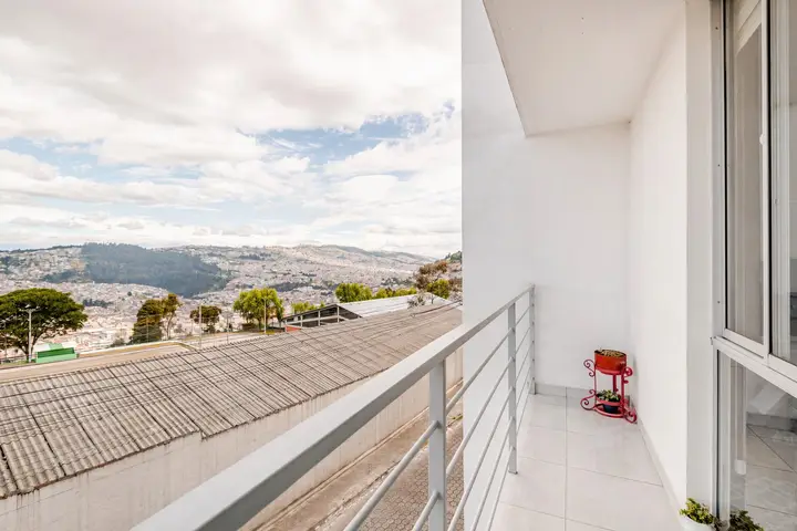 Balcony with a panoramic view over the Old Town of Quito and the Andes
