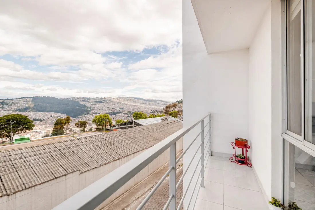 Balcony with a panoramic view over the Old Town of Quito and the Andes
