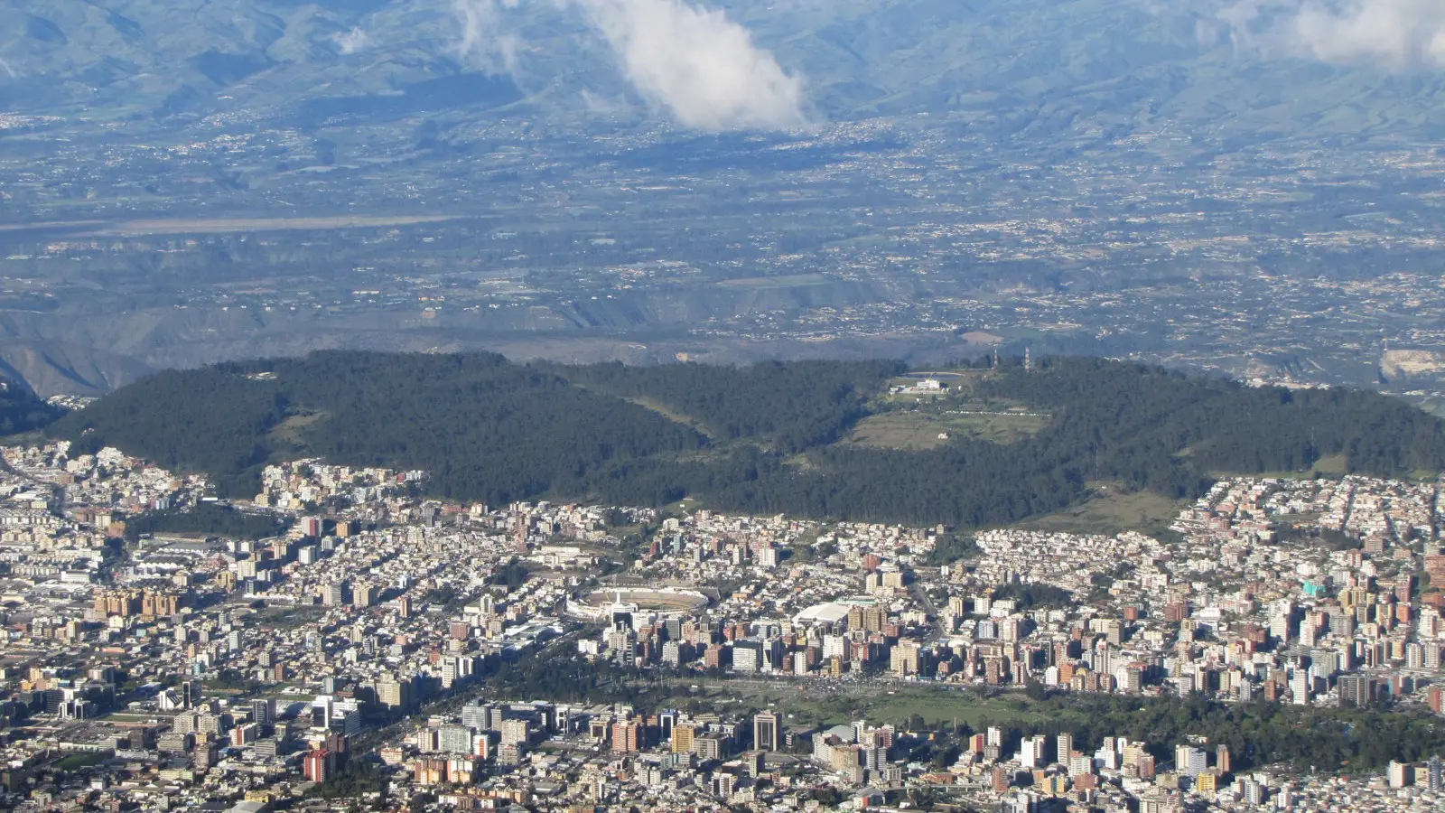 The wide view over Quito and the surrounding mountains from the TelefériQo cable car